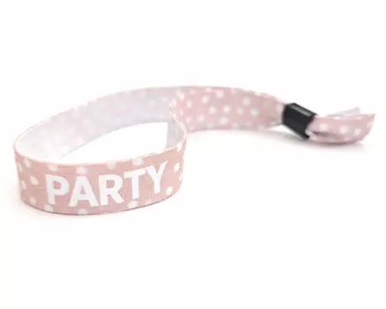 Pink festival wristbands with dots