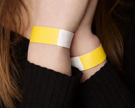 Yellow paper wristbands