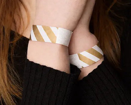 Gold and white striped paper wristbands